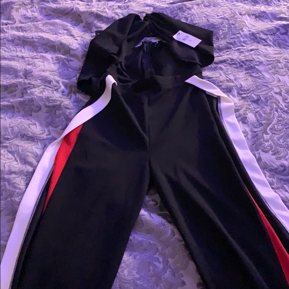 Black white and red jumpsuit with thighs open